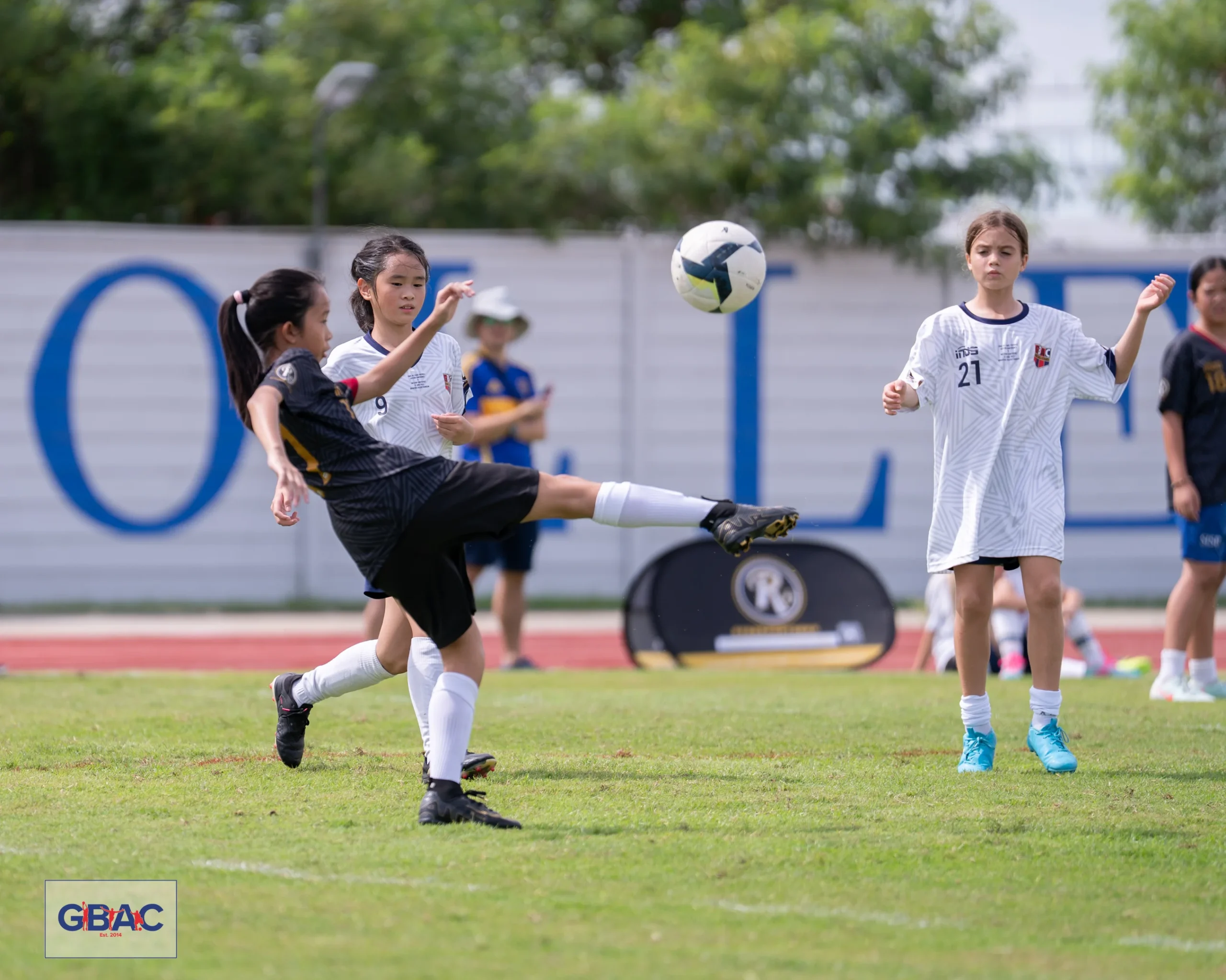 Junior girls battle for the ball at GBAC All-Stars